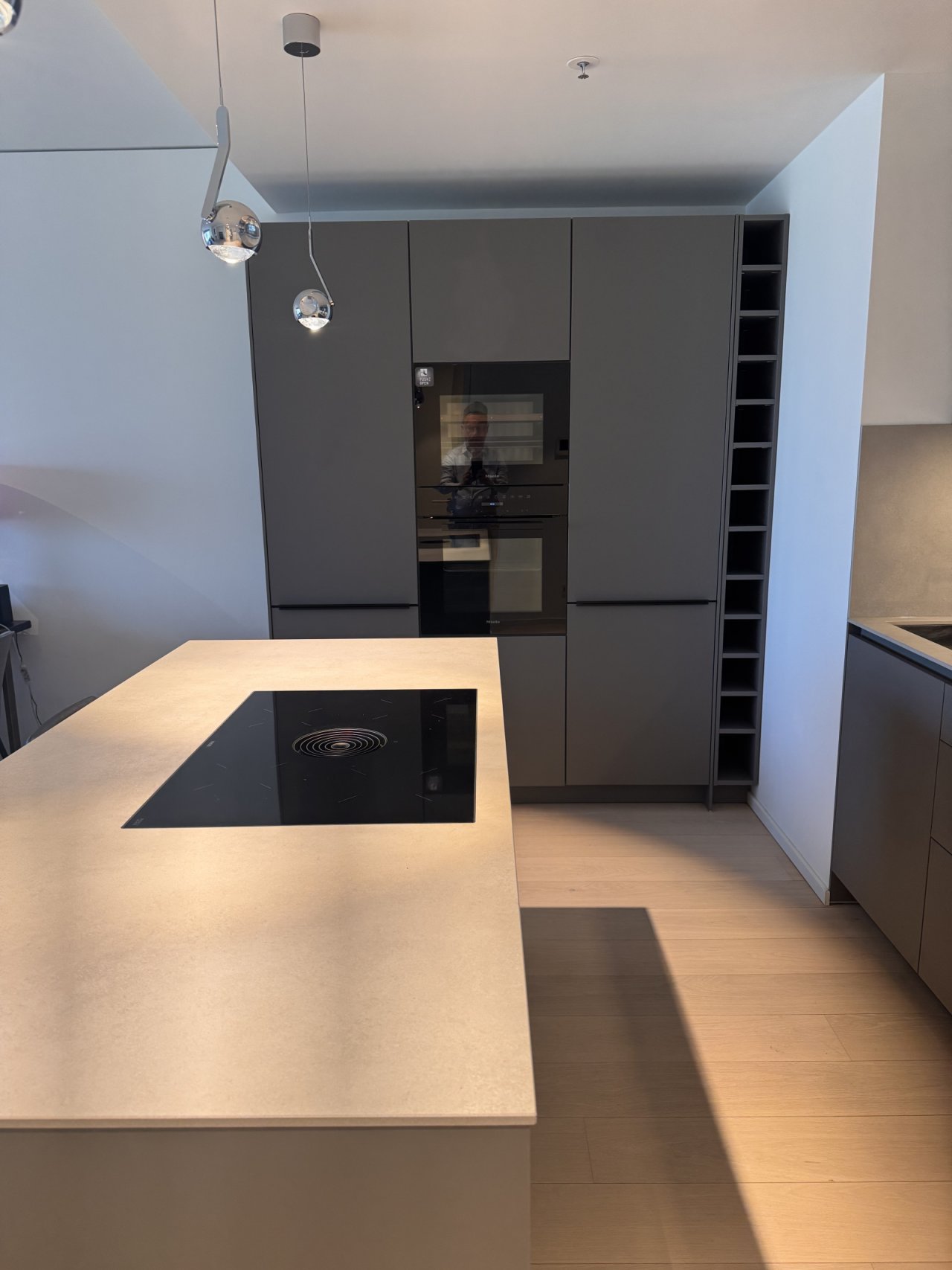 High-quality kitchen equipment with integrated cooktop and extensive storage solutions