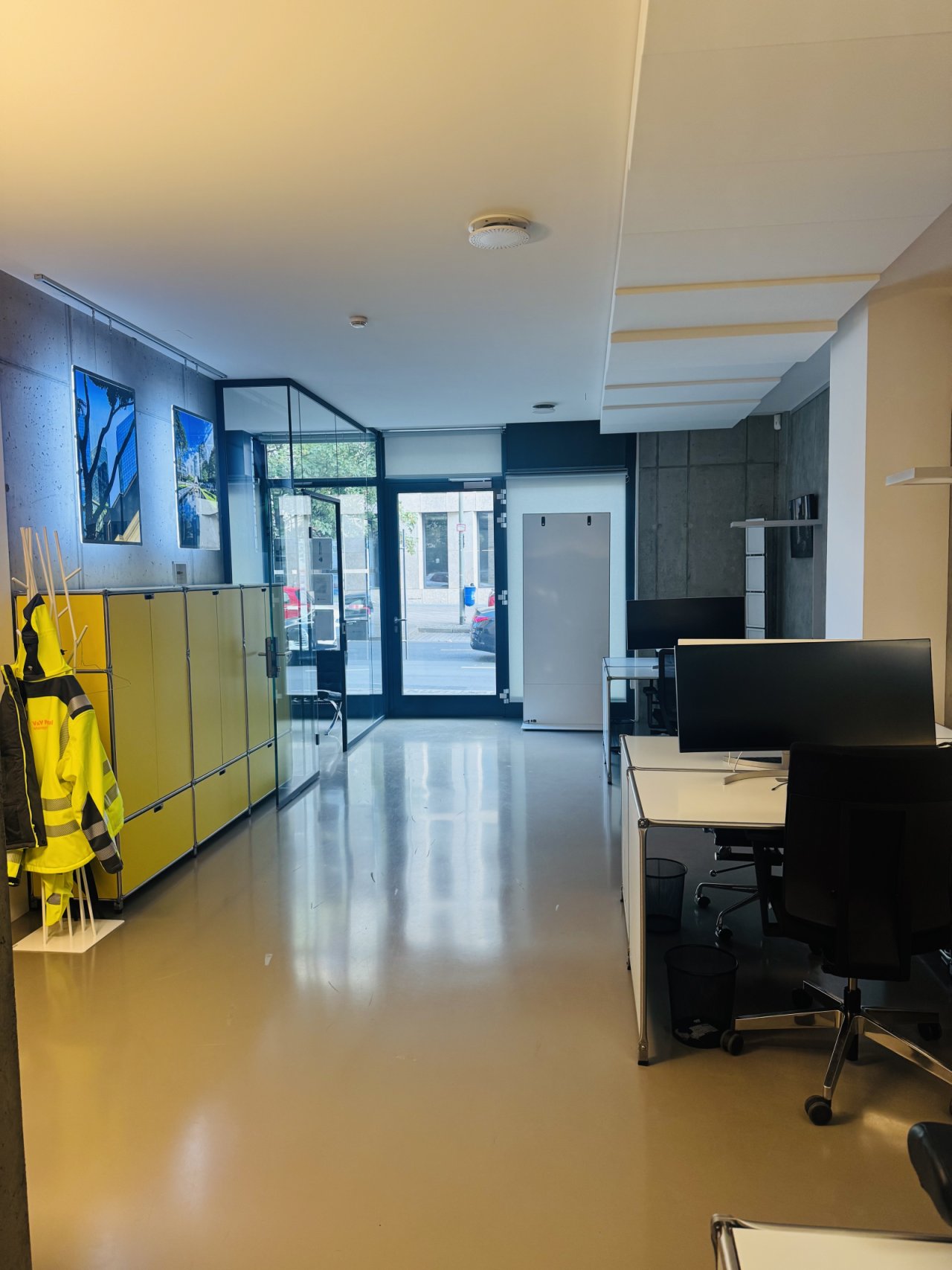 Reception area with direct street access and modern glass entrance portal